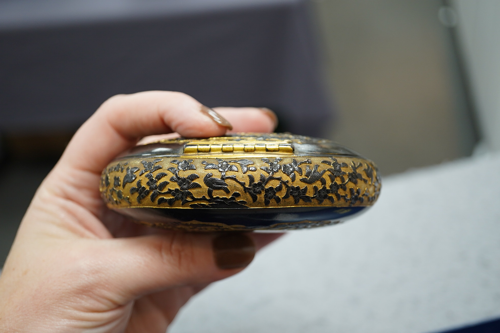 A Japanese export gilt bronze Sawasa oval tobacco box, 18th century